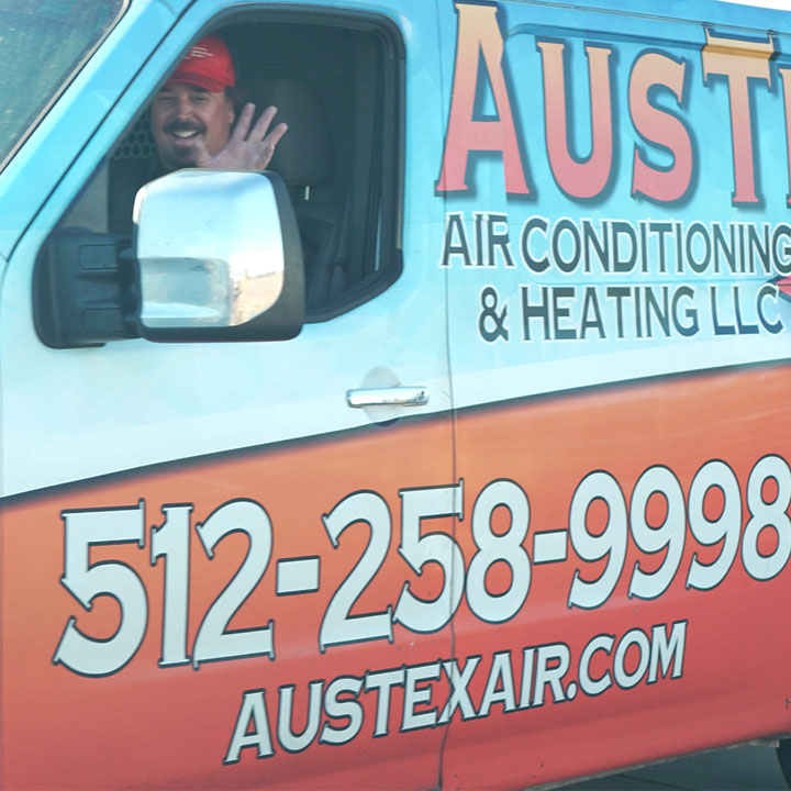 Austex Air conditioning service truck parked at residential home in Georgetown Texas