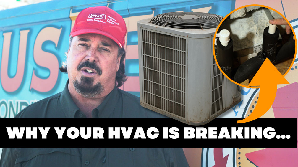 HVAC technician performing preventative maintenance on residential air conditioning system